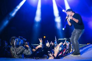 Runaway Country Music Fest, singer sings to excited crowd